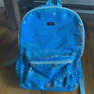 Justice blue flip sequin backpack